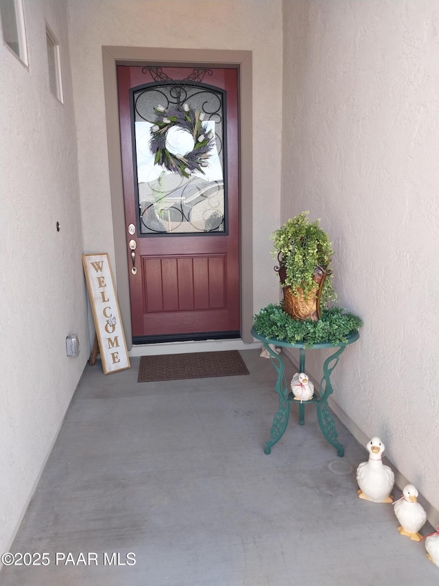 6166 E Shetland Way, Prescott Valley, AZ 86314 - doorway to property with stucco siding