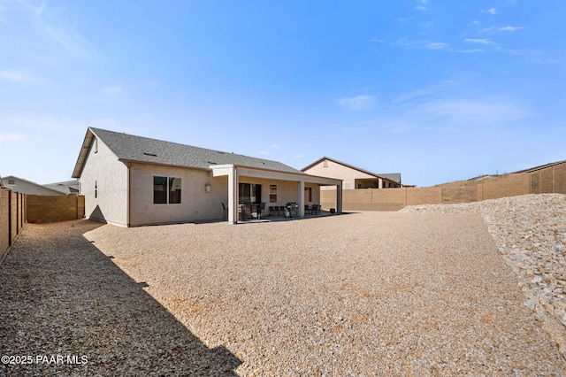 6166 E Shetland Way, Prescott Valley, AZ 86314 - back of property featuring a fenced backyard, stucco siding, a patio, and a shingled roof