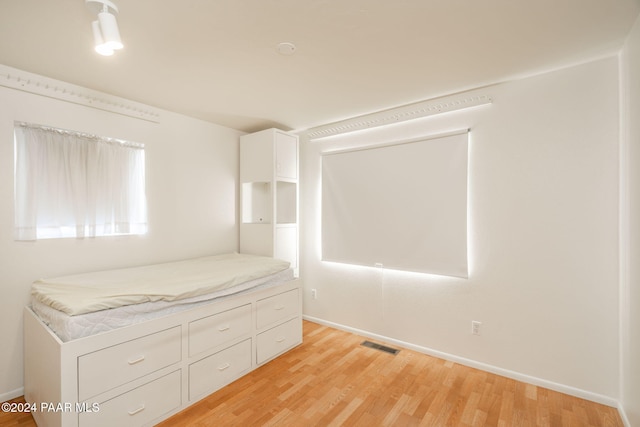 unfurnished bedroom with light hardwood / wood-style flooring