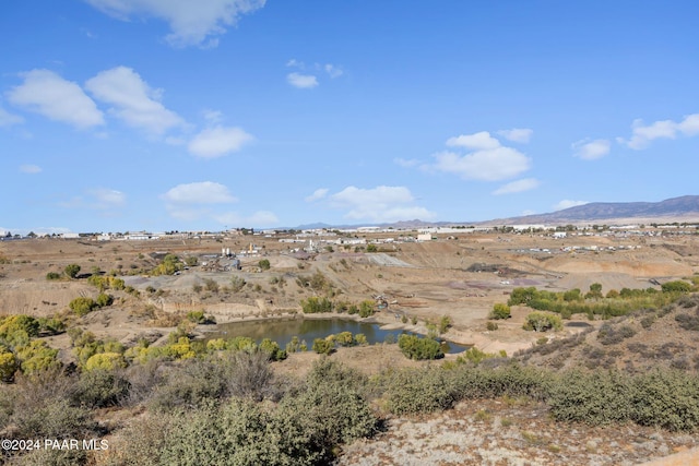 view of mountain feature with a water view