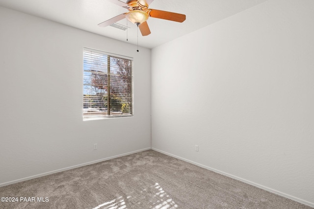 unfurnished room with carpet flooring