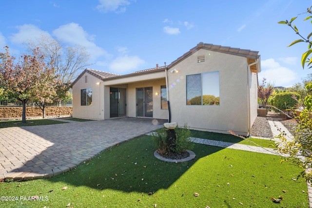 back of house featuring a patio