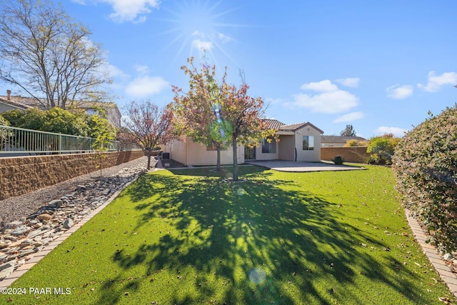 view of yard with a patio area