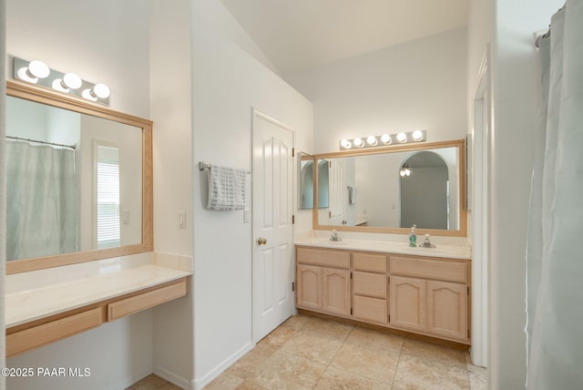 full bath with double vanity and a sink