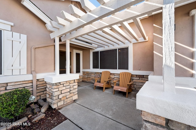 view of patio featuring a pergola