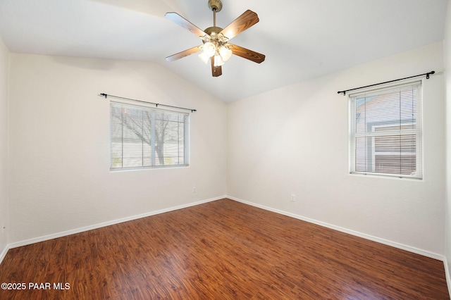 unfurnished room with hardwood / wood-style flooring, vaulted ceiling, and ceiling fan