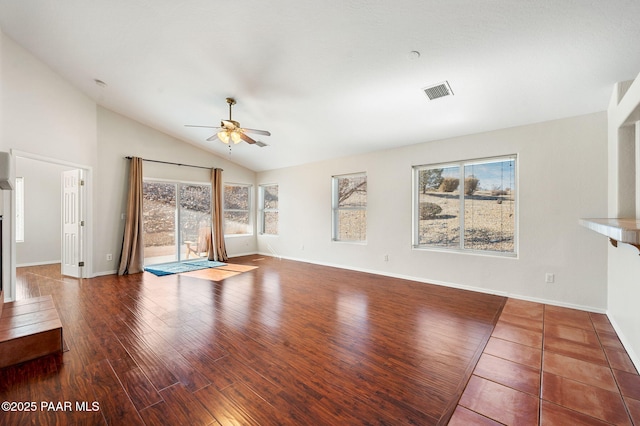 unfurnished living room with hardwood / wood-style flooring, ceiling fan, and lofted ceiling