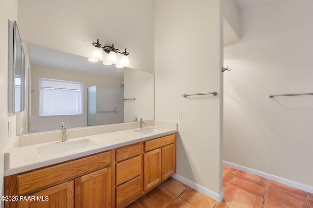 bathroom with tile patterned flooring and vanity