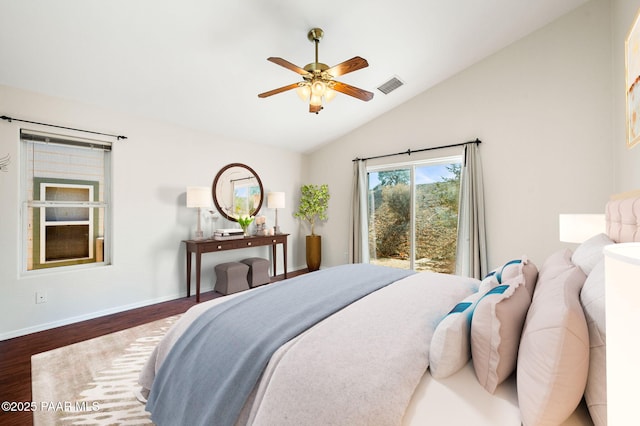 bedroom featuring lofted ceiling, access to exterior, dark wood-type flooring, and ceiling fan