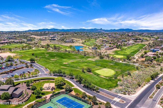 bird's eye view with a water and mountain view