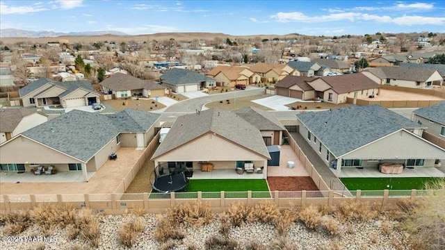 bird's eye view with a residential view and a mountain view