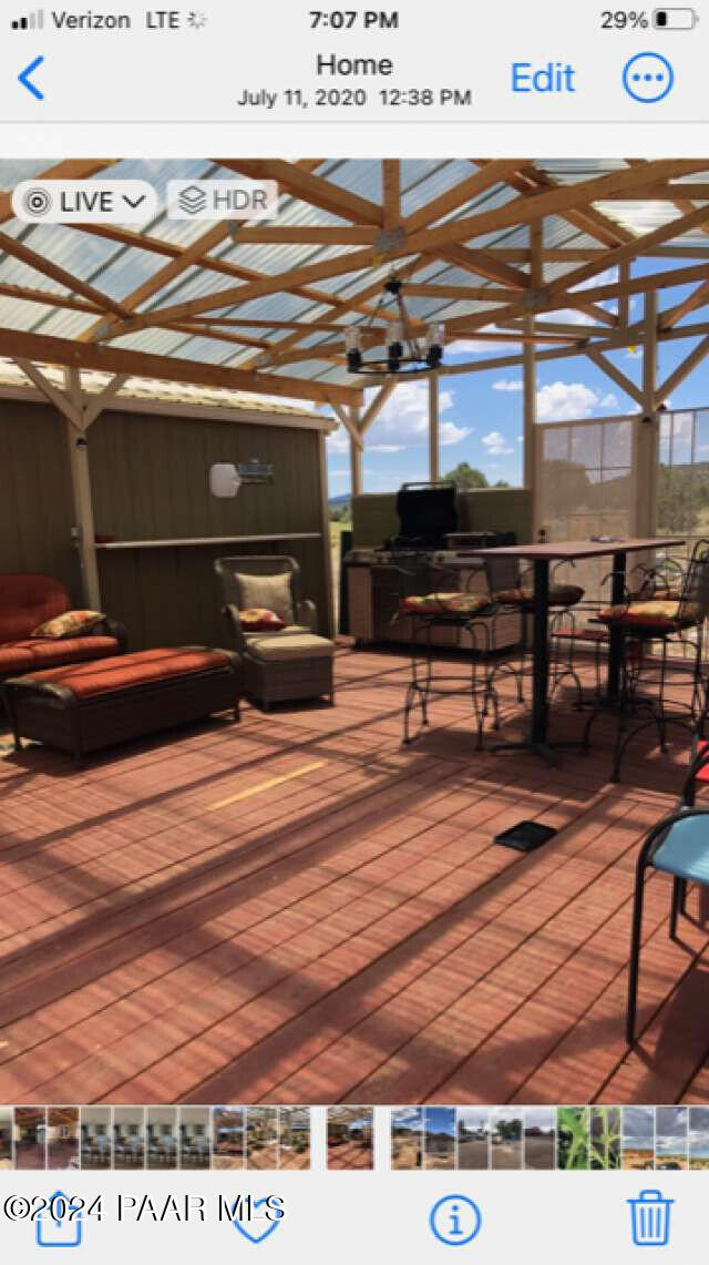 wooden terrace with ceiling fan