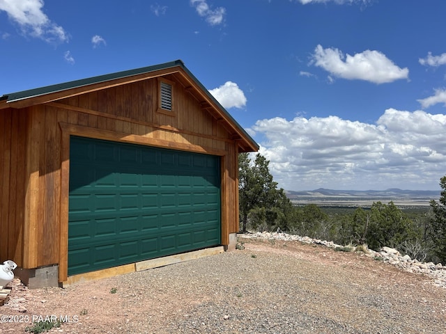 garage featuring a mountain view