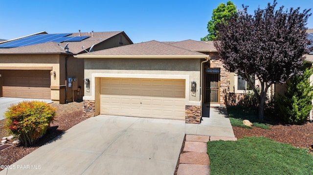 6723 E Arden Ct Unit 5, Prescott Valley, AZ 86314 - ranch-style home with stone siding, stucco siding, an attached garage, and driveway
