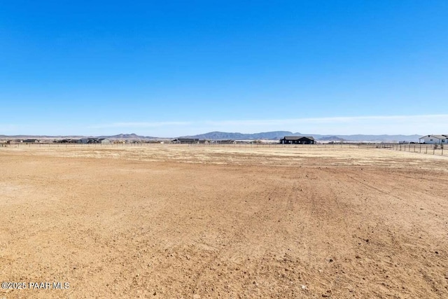 property view of mountains featuring a rural view