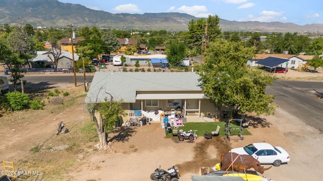 drone / aerial view featuring a mountain view