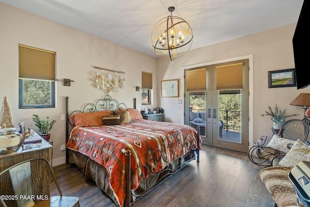 965 Northwood Loop, Prescott, AZ 86303 - bedroom with french doors, a chandelier, access to outside, and hardwood / wood-style flooring