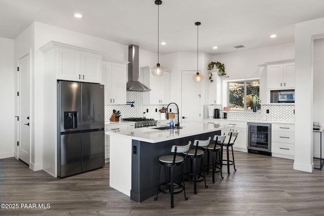 1232 Jordin Dr, Prescott, AZ 86303 - kitchen featuring white cabinetry, sink, wine cooler, stainless steel fridge with ice dispenser, and wall chimney exhaust hood