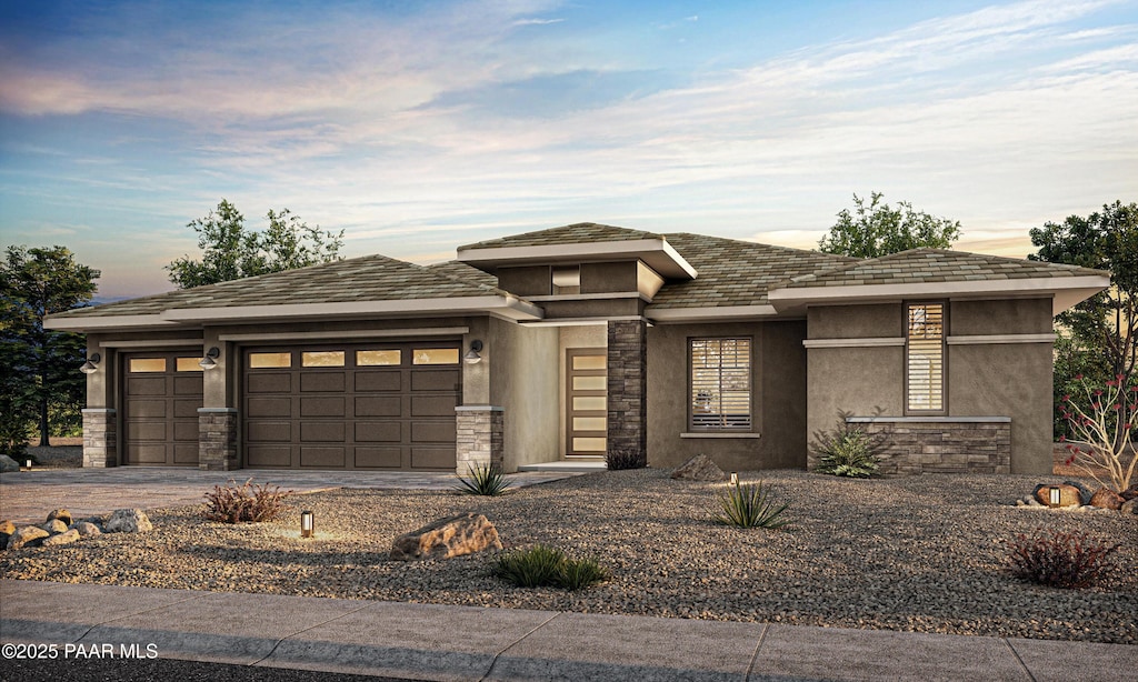 1157 Irwin Way, Prescott, AZ 86301 - prairie-style house with stone siding, a garage, concrete driveway, and stucco siding
