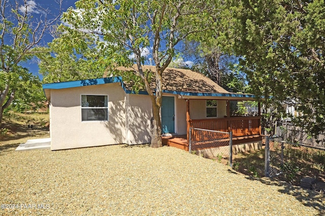 view of front of home with a deck