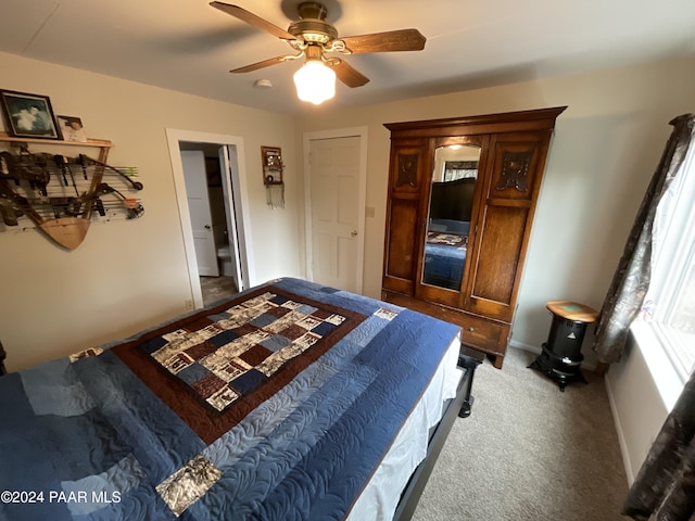 bedroom with carpet flooring and ceiling fan