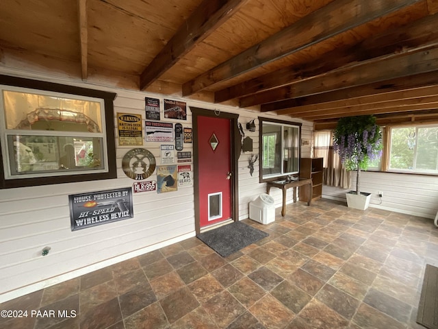 doorway to property featuring covered porch