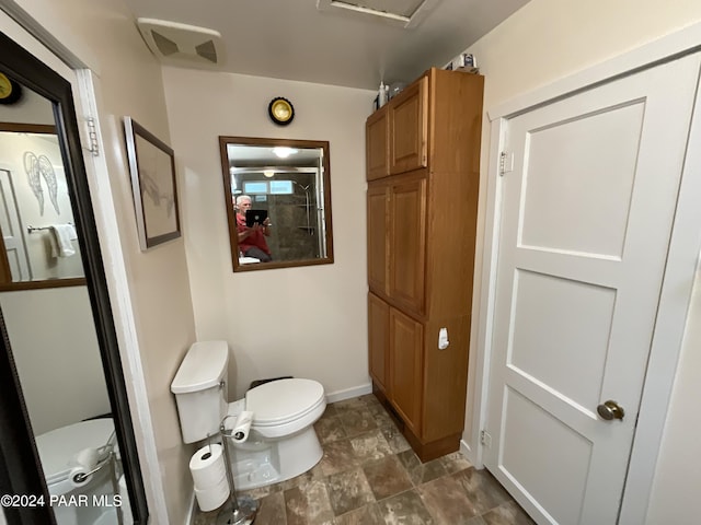 bathroom featuring toilet