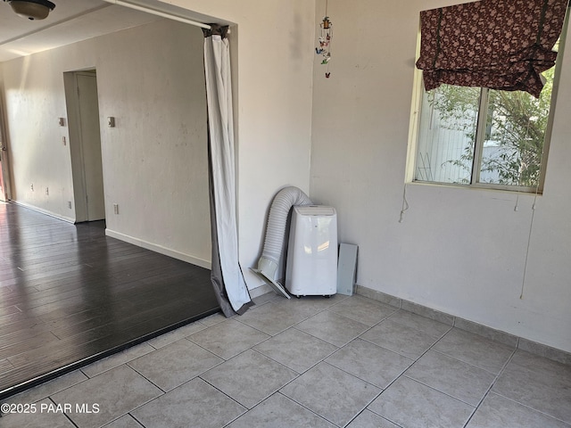 3916 N Catherine Dr, Prescott Valley, AZ 86314 - empty room featuring tile patterned floors and baseboards