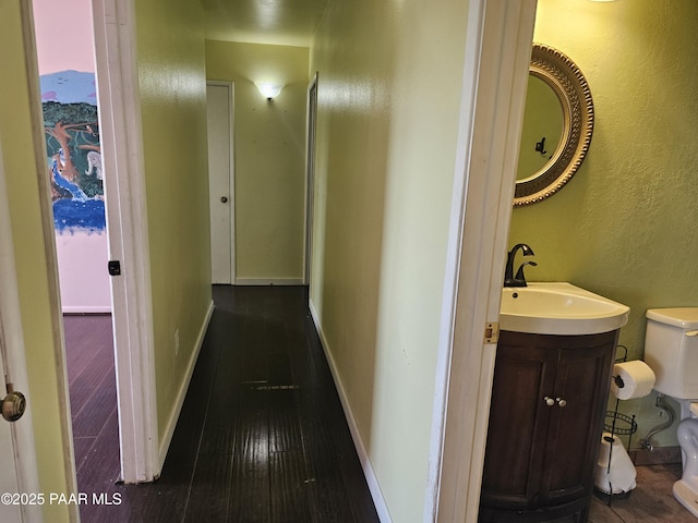 3916 N Catherine Dr, Prescott Valley, AZ 86314 - hallway featuring dark wood finished floors and a textured wall