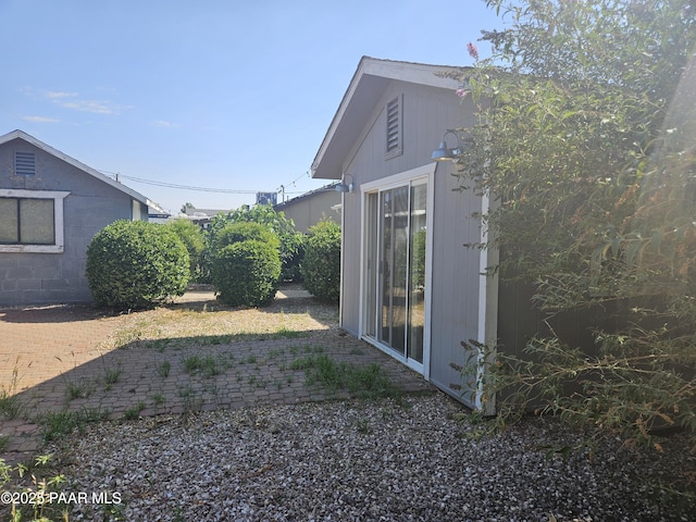 3916 N Catherine Dr, Prescott Valley, AZ 86314 - view of home's exterior with a patio and concrete block siding