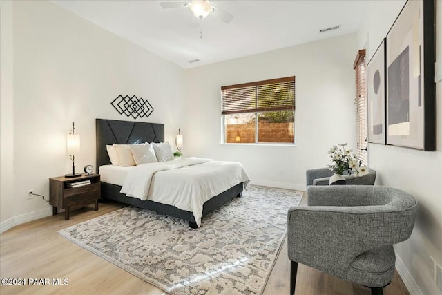 bedroom featuring ceiling fan and hardwood / wood-style floors