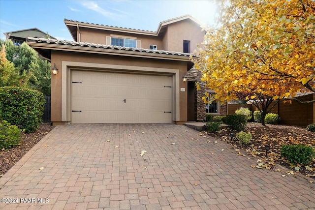 view of front of house with a garage