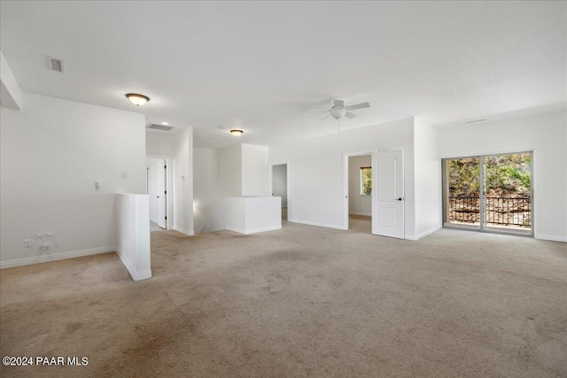 carpeted empty room with ceiling fan