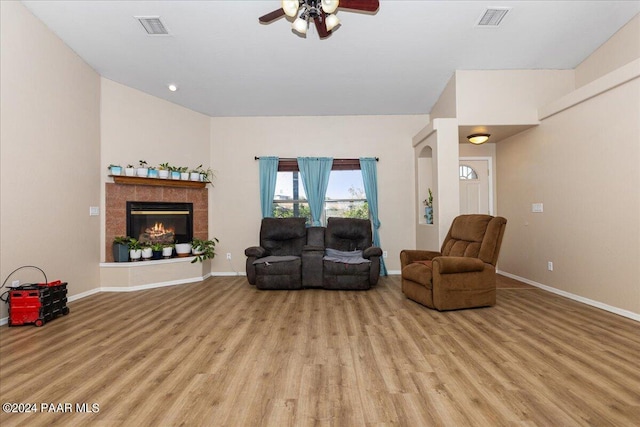1525 Salida Del Sol, Chino Valley, AZ 86323 - living room with light wood-style flooring, ceiling fan, baseboards, a fireplace, and recessed lighting