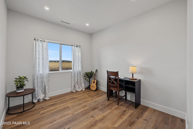 office space featuring hardwood / wood-style floors