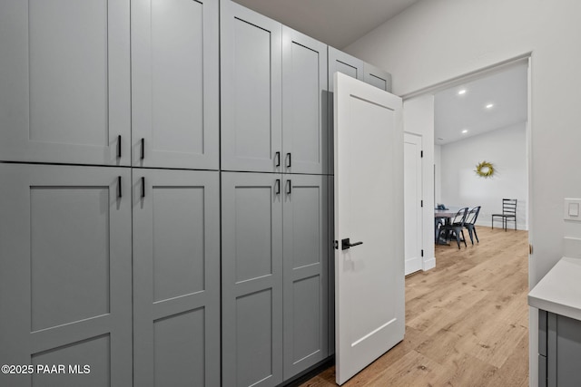 hall with light hardwood / wood-style flooring