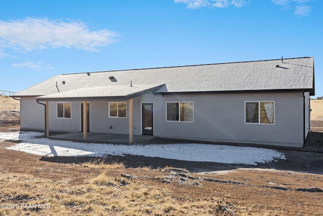 rear view of house with a patio area