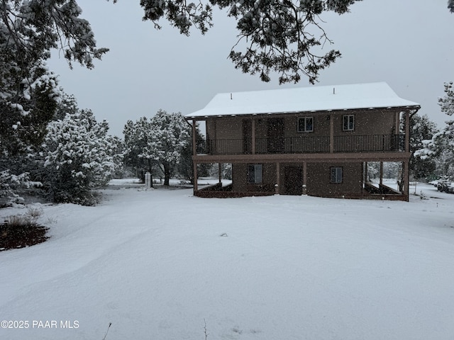 view of snow covered property