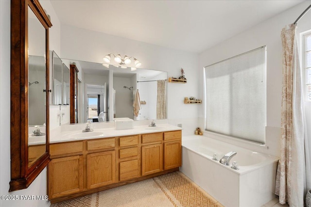 1250 Pronghorn Trl, Chino Valley, AZ 86323 - full bathroom with double vanity, a garden tub, plenty of natural light, and a sink