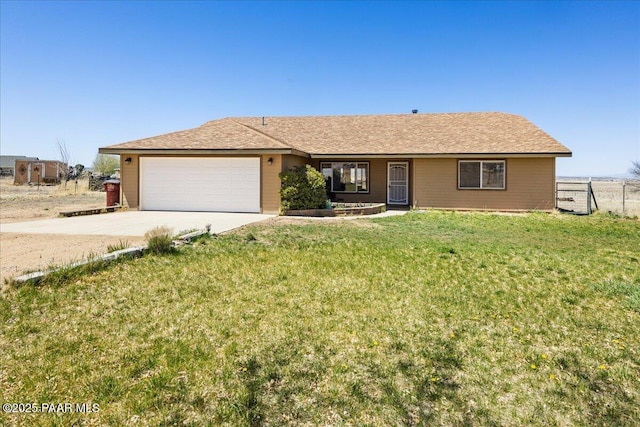 1250 Pronghorn Trl, Chino Valley, AZ 86323 - single story home featuring a garage, fence, driveway, and a front yard