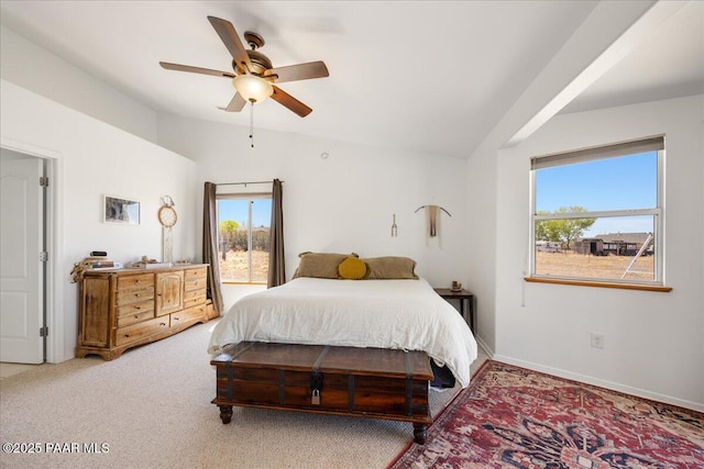 1250 Pronghorn Trl, Chino Valley, AZ 86323 - bedroom featuring ceiling fan, vaulted ceiling, light colored carpet, and baseboards