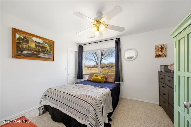 1250 Pronghorn Trl, Chino Valley, AZ 86323 - bedroom featuring baseboards, light carpet, and ceiling fan
