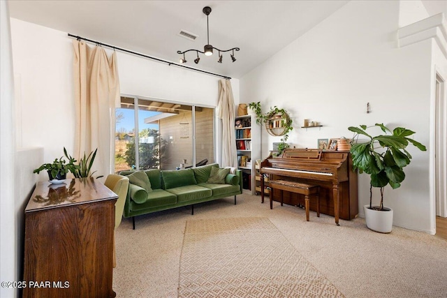 1250 Pronghorn Trl, Chino Valley, AZ 86323 - sitting room with visible vents, vaulted ceiling, and carpet