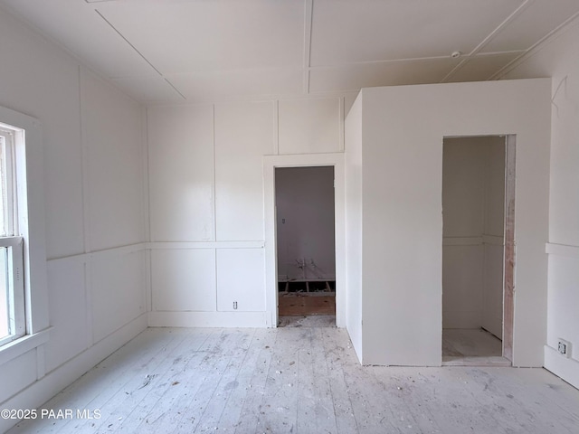 12972 E Main St, Dewey-Humboldt, AZ 86329 - unfurnished bedroom with a decorative wall