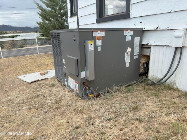 12972 E Main St, Dewey-Humboldt, AZ 86329 - exterior view of a central air condition unit and a mountain backdrop