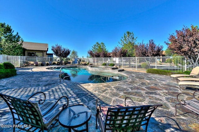 view of pool with a patio area