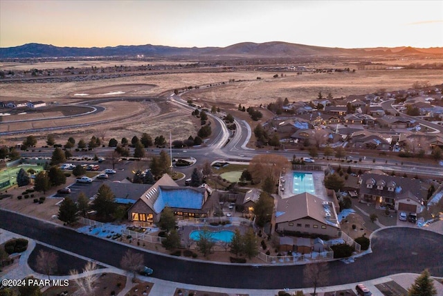 aerial view at dusk with a mountain view