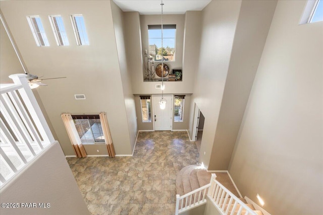 entryway with a high ceiling