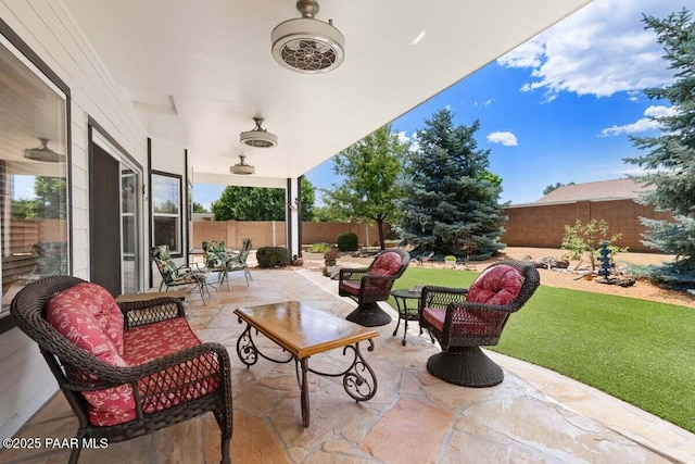 7605 E Circle Wagons Way, Prescott Valley, AZ 86315 - fenced backyard featuring a patio and outdoor lounge area