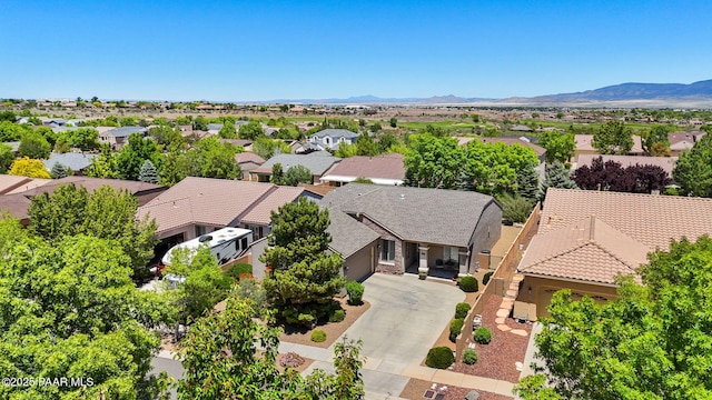 7334 E Goodnight Ln, Prescott Valley, AZ 86314 - aerial perspective of suburban area with a mountain backdrop